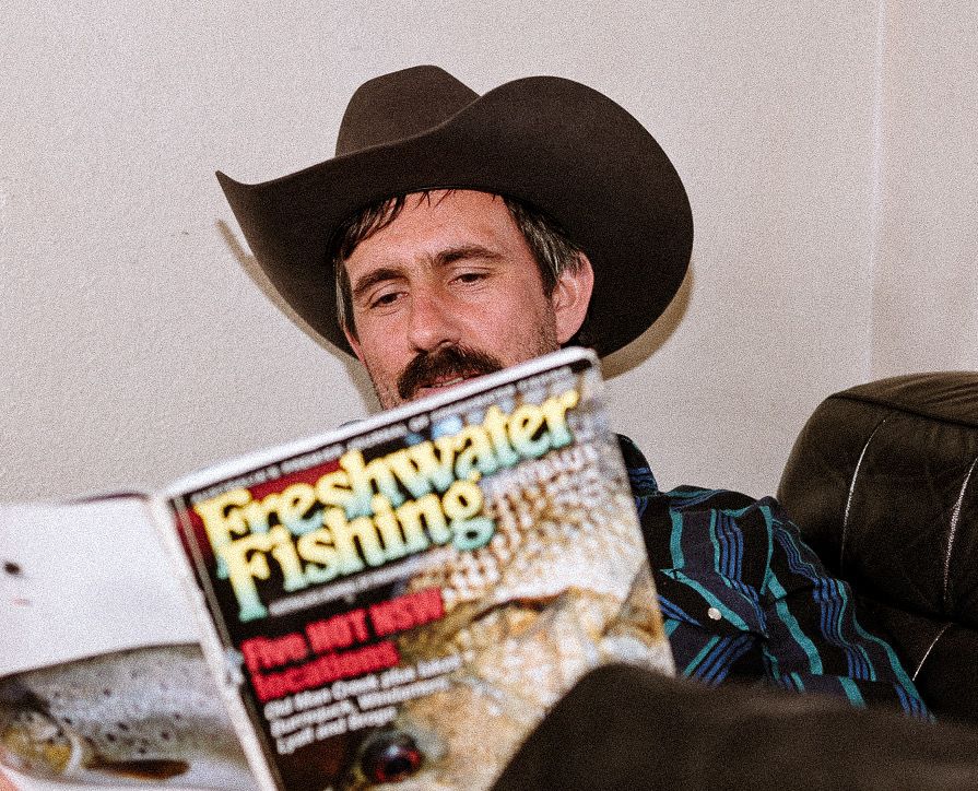 Dave Kent reading Freshwater Fishing magazine